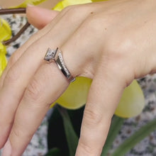 Load and play video in Gallery viewer, Barkev&#39;s Tension Twist Half Bezel Set Princess-Cut Diamond Engagement Ring
