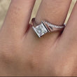 Load and play video in Gallery viewer, Barkev&#39;s Tension Twist Half Bezel Set Princess-Cut Diamond Engagement Ring
