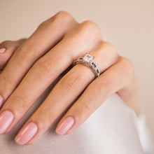 Load image into Gallery viewer, Kirk Kara White Gold &quot;Charlotte&quot; Blue Sapphire Baguette and Diamond Engagement Ring On Model Hand
