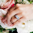 Load image into Gallery viewer, Kirk Kara White Gold Dahlia Marquise Shaped Blue Sapphire Diamond Engagement Ring And Band on model 
