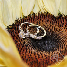 Load image into Gallery viewer, Kirk Kara White Gold &quot;Lori&quot; Vintage Style Twist Diamond Engagement Ring SetAngled Front View with Floral Background

